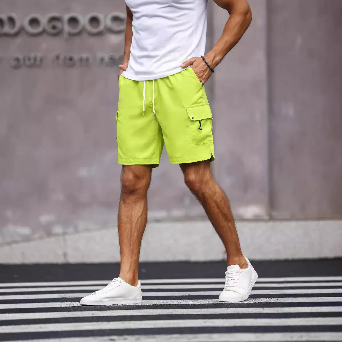 Men's loose fit work shorts in fluorescent green with straight cut and micro-elastic waistband