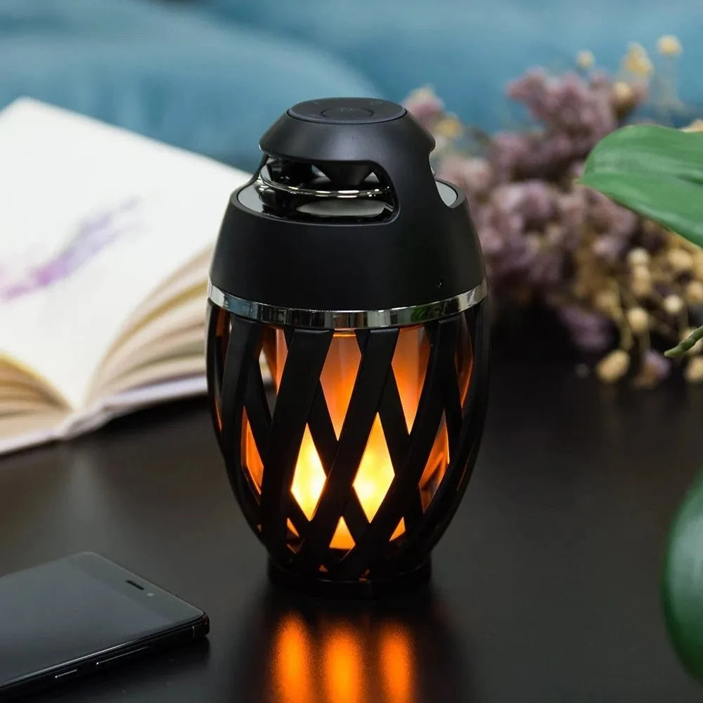Black LED Flame Speaker with realistic flame light effect on a table