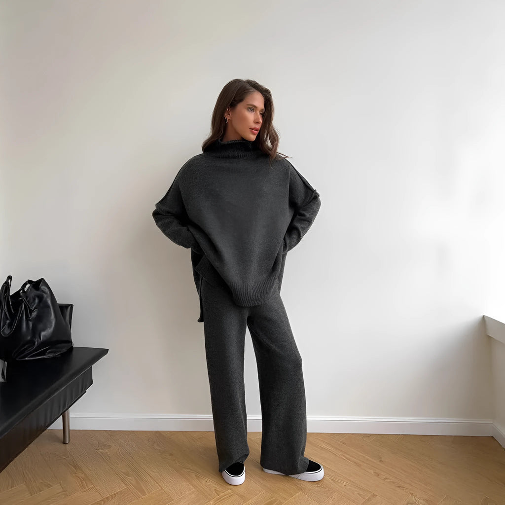 Women's acrylic knit suit set with side-slit sweater and matching trousers in dark gray