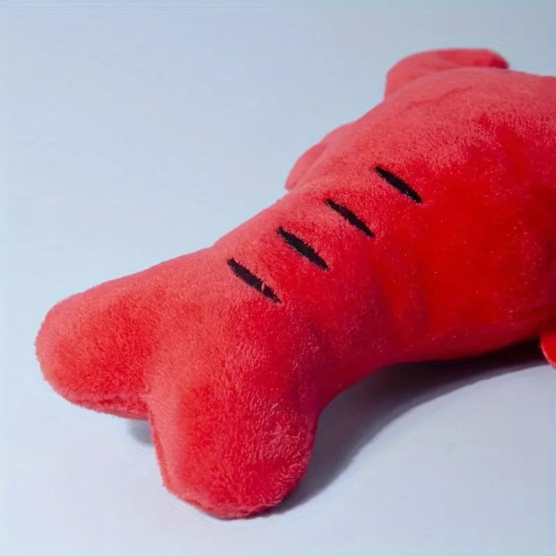 Red crab lobster squeaky stuffed chew toy for small and medium-sized dogs on a white background.