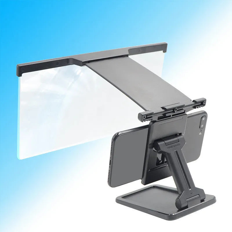 Black 12-inch split-screen mobile phone magnifier with acrylic lens and ABS plastic bracket on a table
