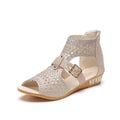 Women's beige PU patent leather sandals with fish mouth toe and back zipper wedge heel.