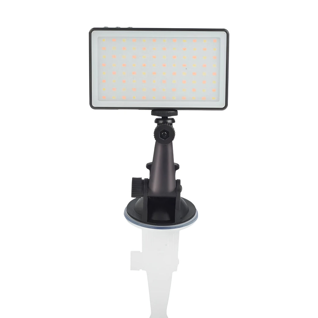 Black aluminium LED conference light with 96 LEDs, measuring 116mm wide, beside a laptop