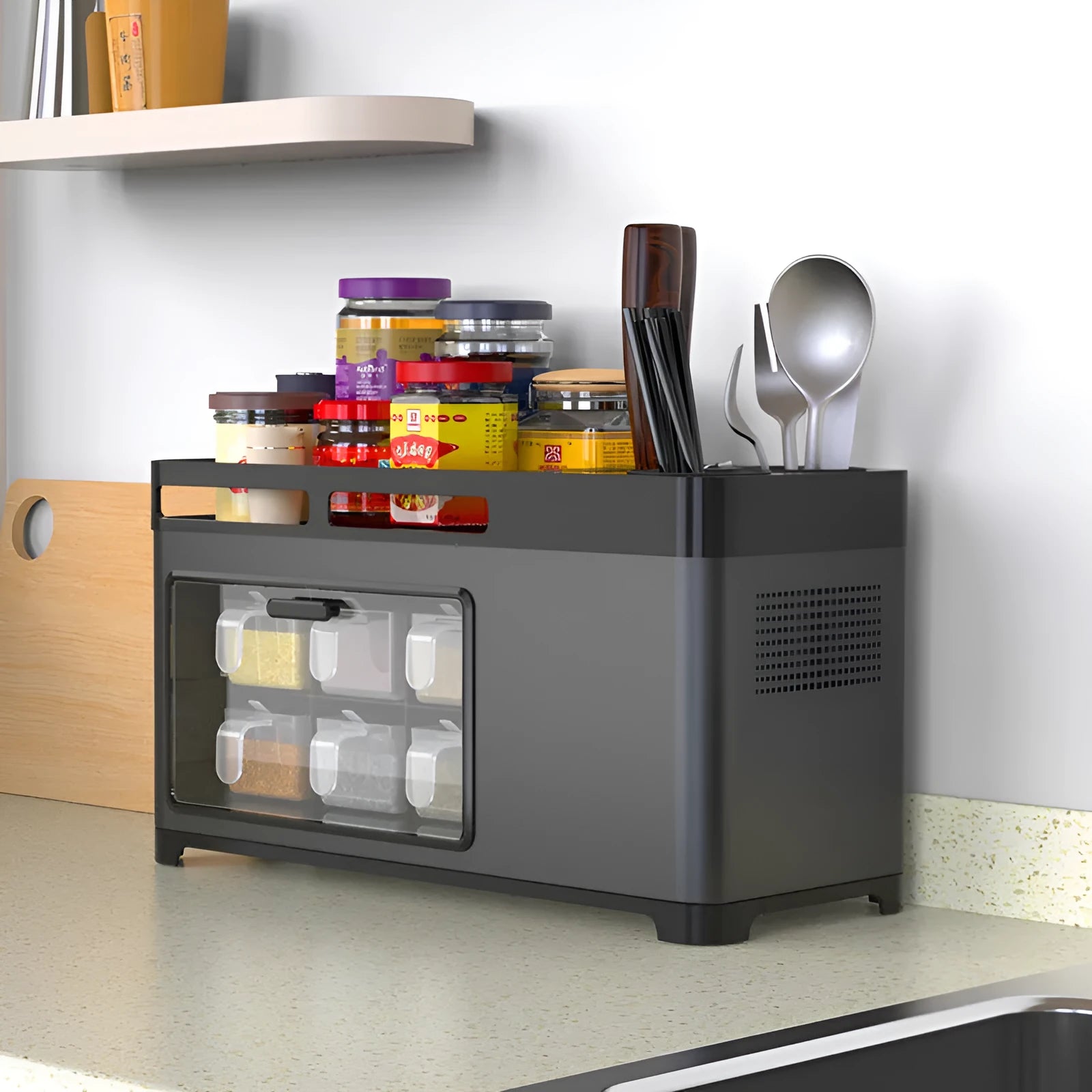 Kitchen storage box with lid made of PP and stainless steel in silver finish, holding seasoning bottles, knife and chopsticks on a shelf