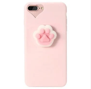 Soft pink silicone iPhone case with a raised 3D cartoon cat design on the back.