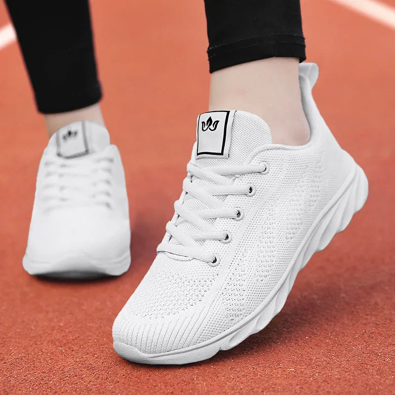 Women's high top flat board shoe with artificial PU upper, cross bind belt, and hollow out design in white, pink, or black.