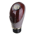PU leather manual gearshift cover in black with imitation mahogany detailing on a round gearstick