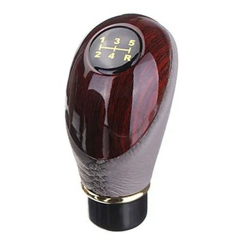 PU leather manual gearshift cover in black with imitation mahogany detailing on a round gearstick