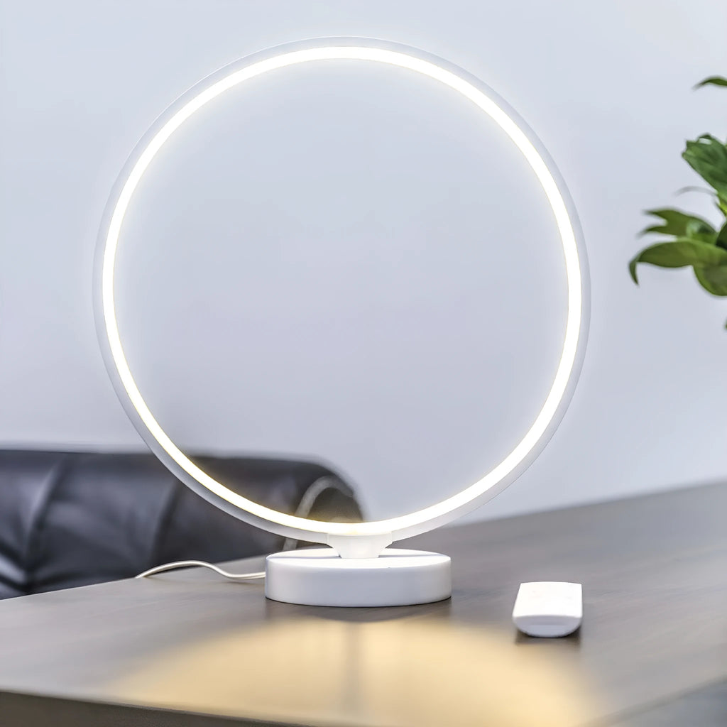 White full moon lamp table light with remote control on wooden surface