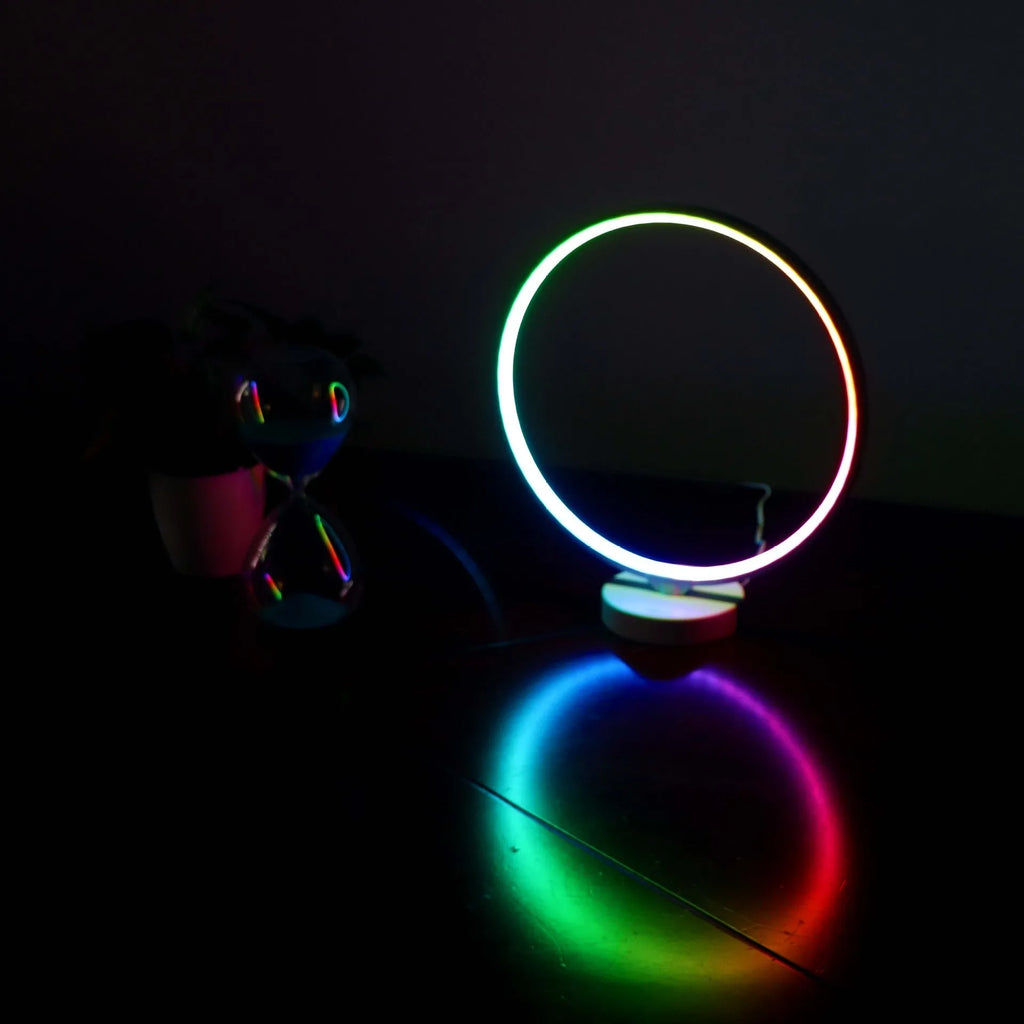 White full moon lamp table light with remote control on wooden surface