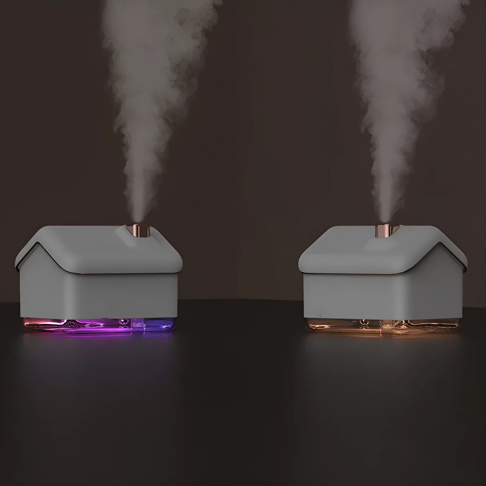 White igloo-shaped ultrasonic humidifier and essential oil diffuser with LED light on a table.