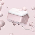 White igloo-shaped ultrasonic humidifier and essential oil diffuser with LED light on a table.