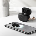 Pebble Series wireless Bluetooth TWS earbuds in black, white, and dark green with charging case