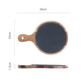 Black wooden pizza dish made from acacia wood and stone, multi-colour sets, on a table