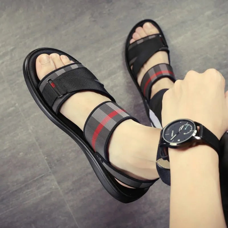 Youth leisure sports sandals with blue Lycra upper and polyurethane sole on a size conversion chart background.