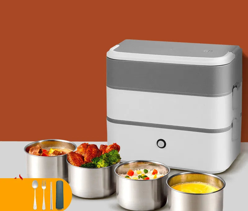 Pink and white portable electric lunch box with push buttons and stainless steel interior.