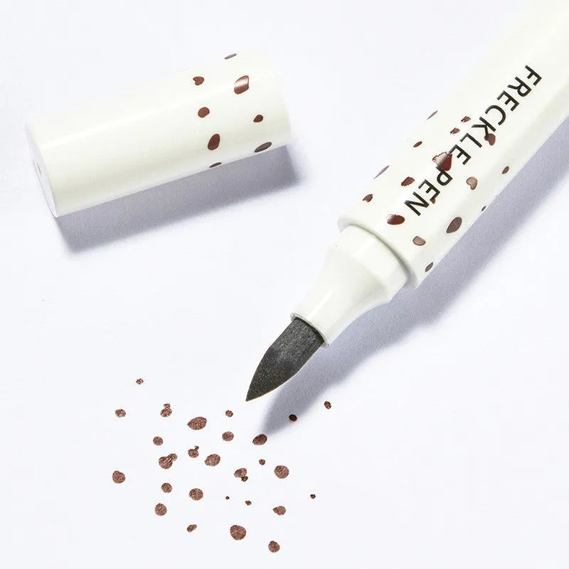 Natural freckle pen creating temporary freckles on face, light brown and dark brown available