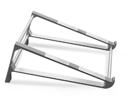 Silver aluminium laptop stand with tablet storage slot underneath, holding a MacBook and an iPad on a desk