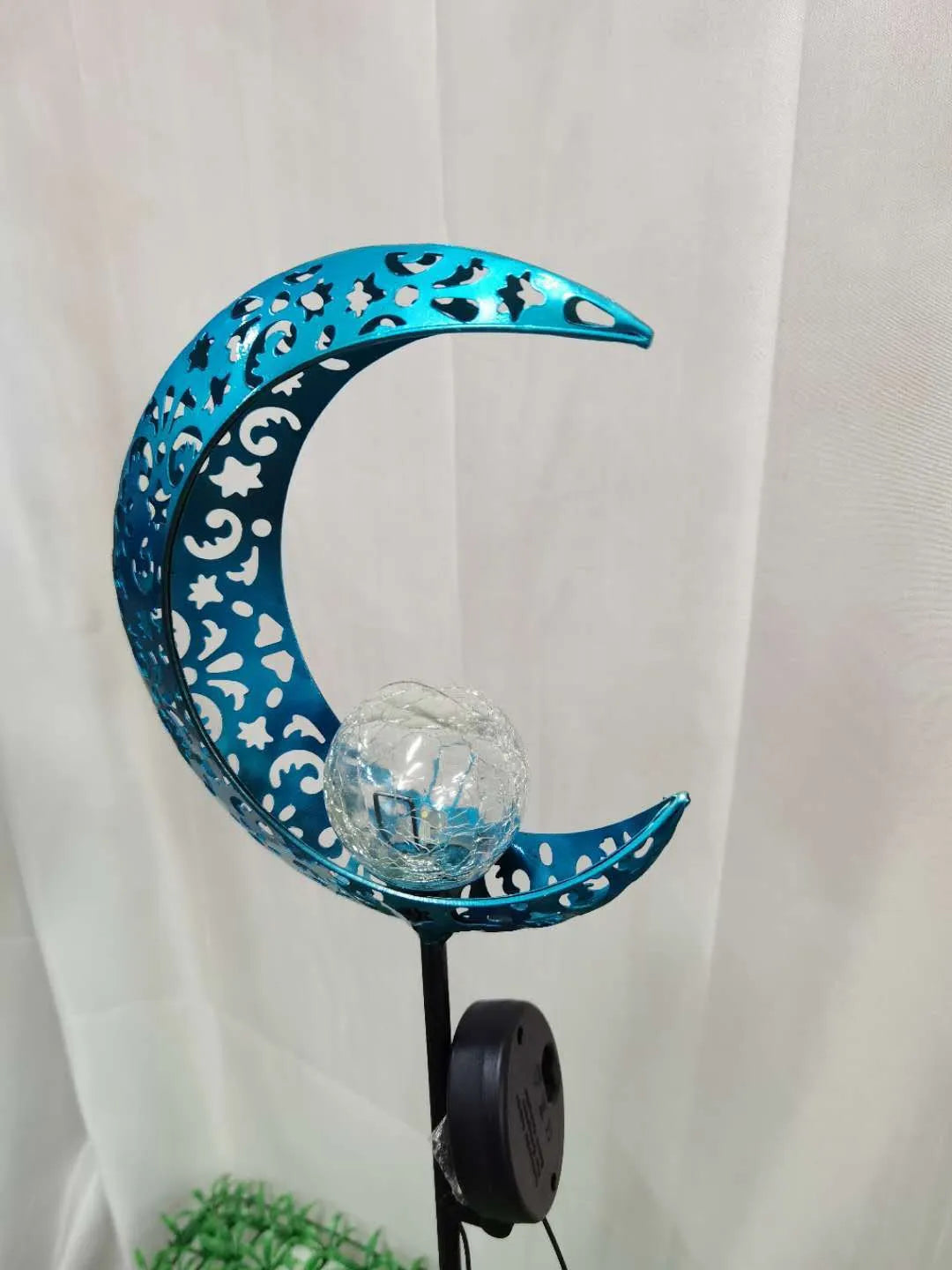 Blue moon shaped solar lawn light with wrought iron frame and crack glass ball LED