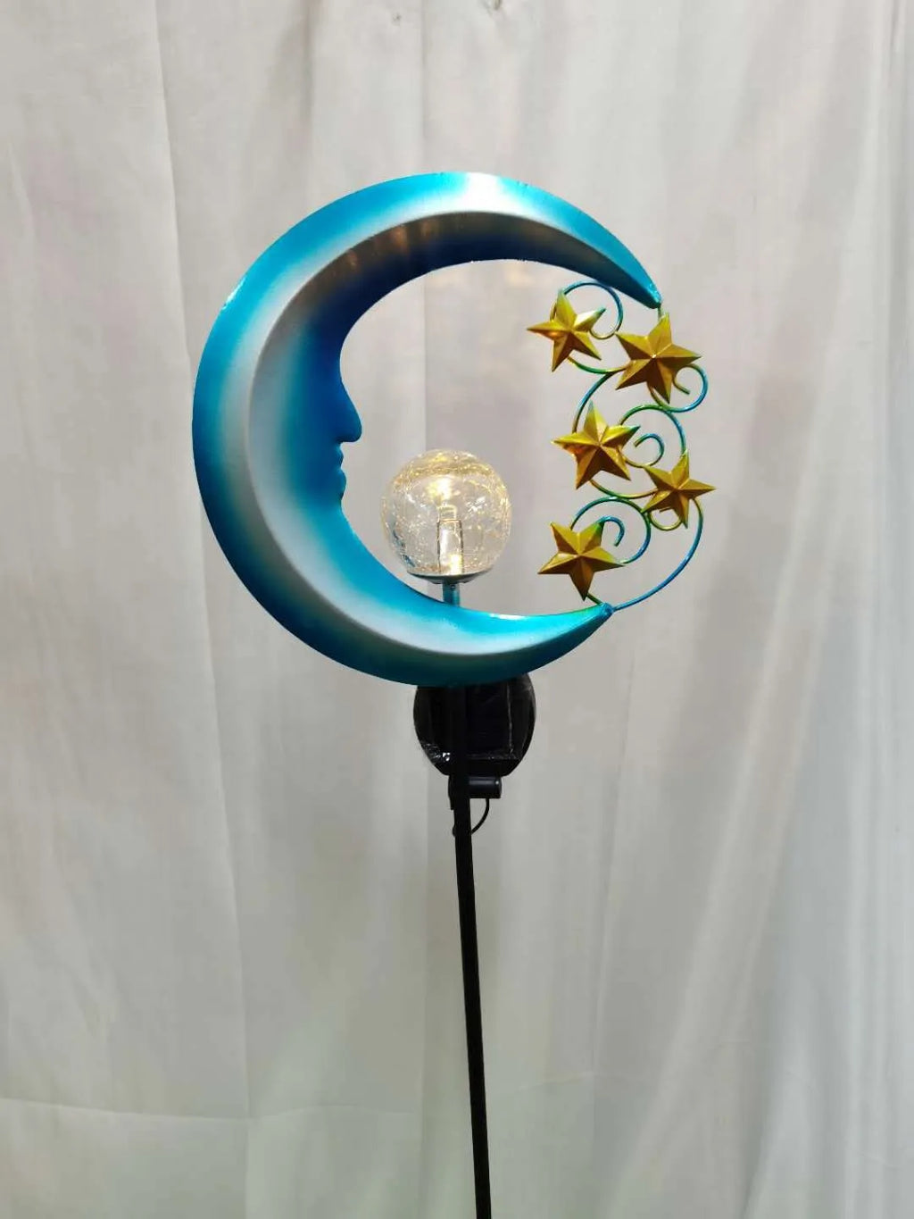 Blue moon shaped solar lawn light with wrought iron frame and crack glass ball LED