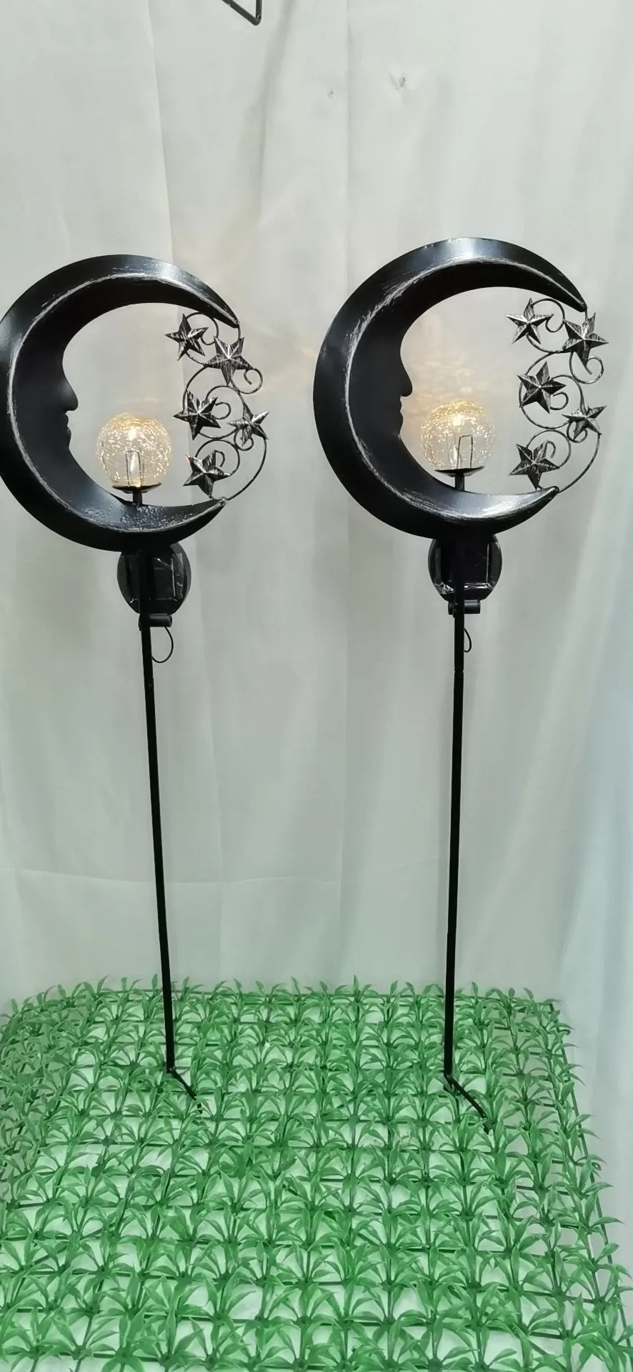 Blue moon shaped solar lawn light with wrought iron frame and crack glass ball LED