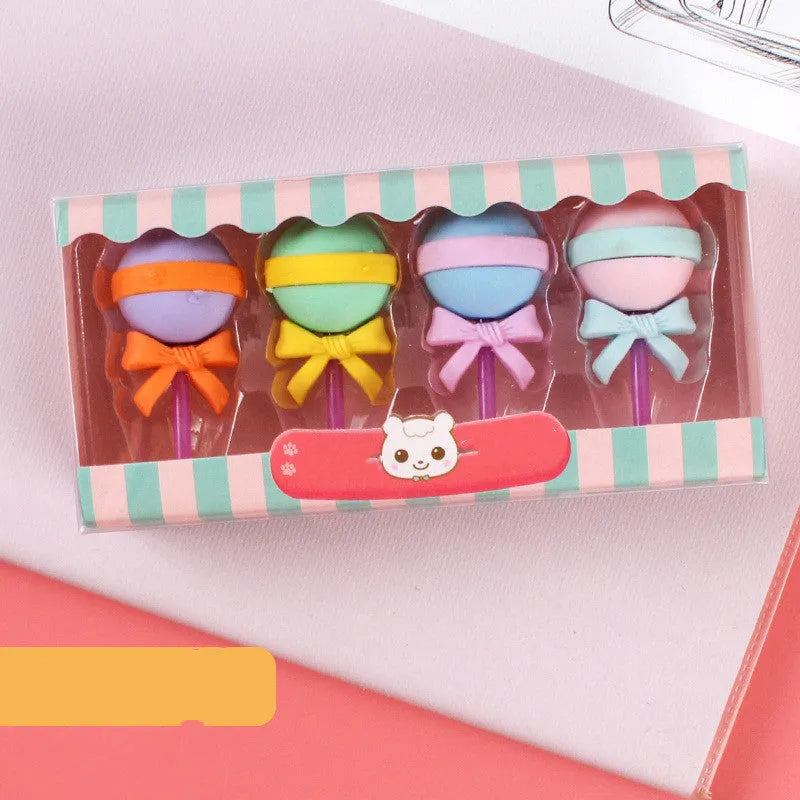 Cartoon eraser set with 12 character shapes including ice cream cones, doughnuts, and lollipops for children