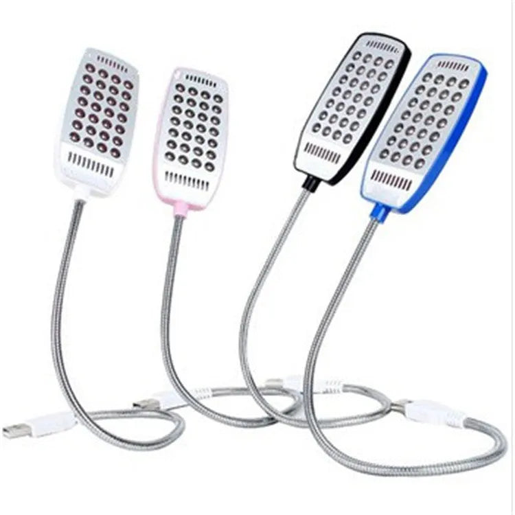 Flexible neck USB LED lamp bent over a book, showing black, white, blue, and pink colour options.