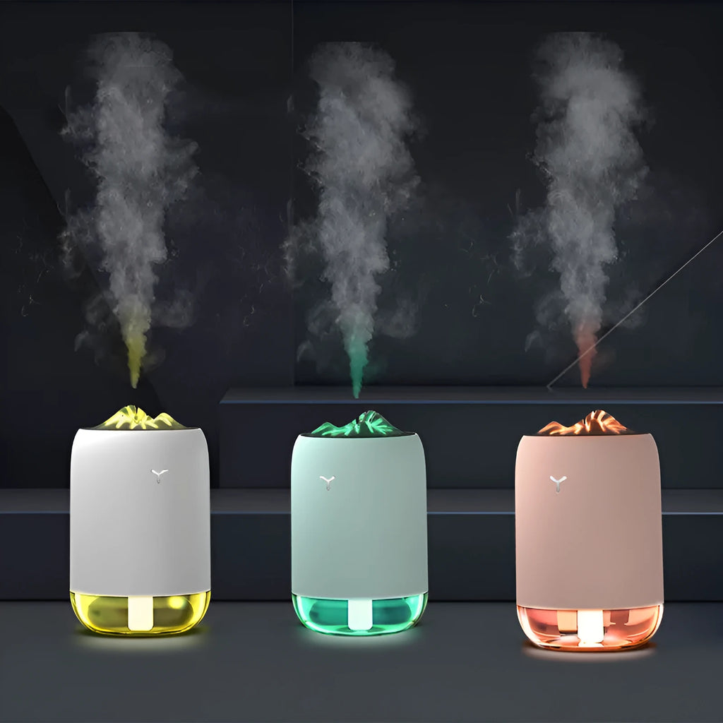Magic Flame columnar humidifier in light blue colour on desktop with USB cable