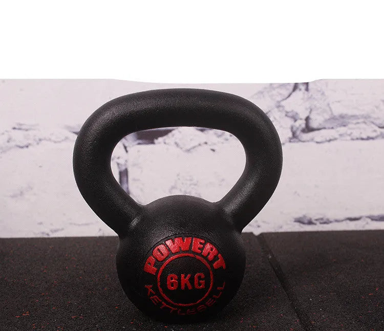 Cast iron kettlebell dumbbell on floor, available in multiple weight sizes from 4kg to 24kg