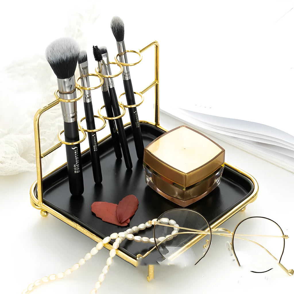 Modern cosmetics storage rack in army green iron art and ceramic on desktop with makeup brushes