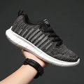 Men's black flying woven sneakers with colour-blocking stitching, breathable mesh upper, MD sole for jogging
