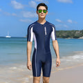 Men's black short-sleeved five-point surfing wetsuit with front zip on grey background