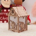 Three rustic wooden Christmas decorations including log bell, Santa Claus house, and snowman house on natural wood background