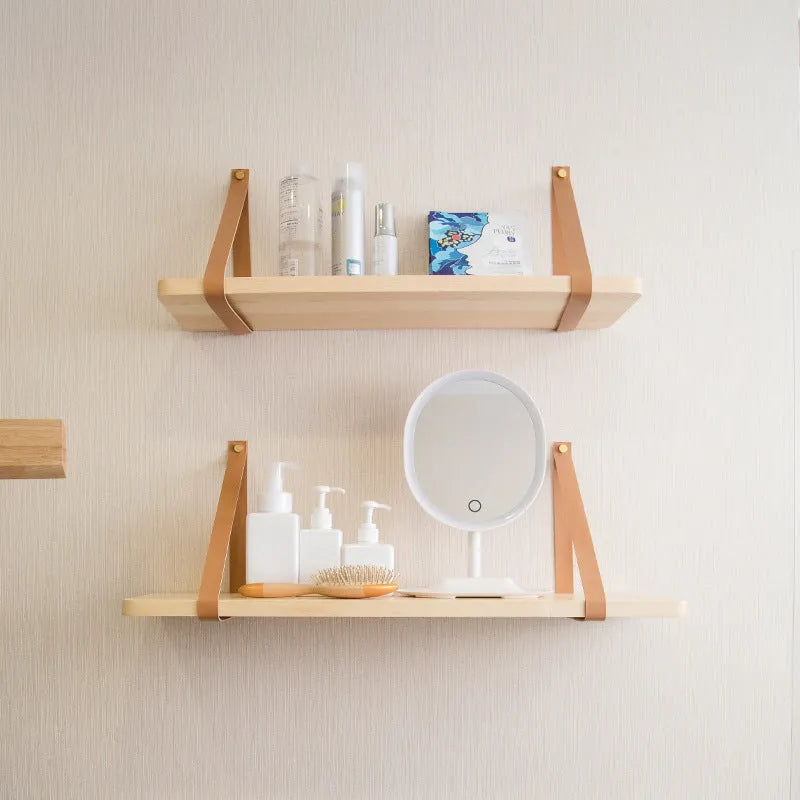 Nordic style pine wood wall mounted storage shelf for remote controls and small items.