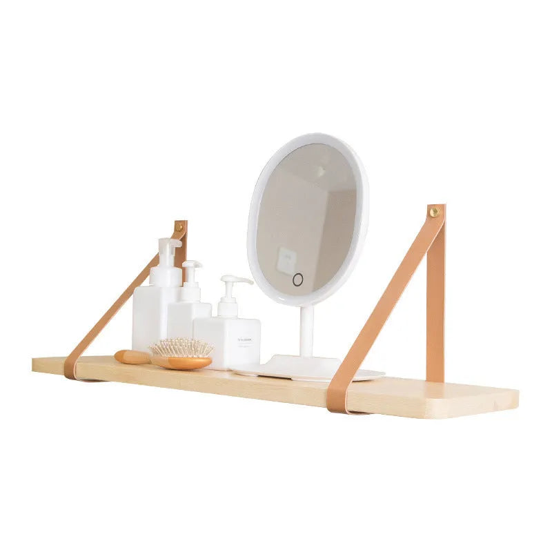 Nordic style pine wood wall mounted storage shelf for remote controls and small items.