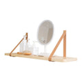Nordic style pine wood wall mounted storage shelf for remote controls and small items.