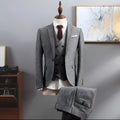 Three-piece men's formal suit set in black, Korean slim fit, includes jacket vest and trousers