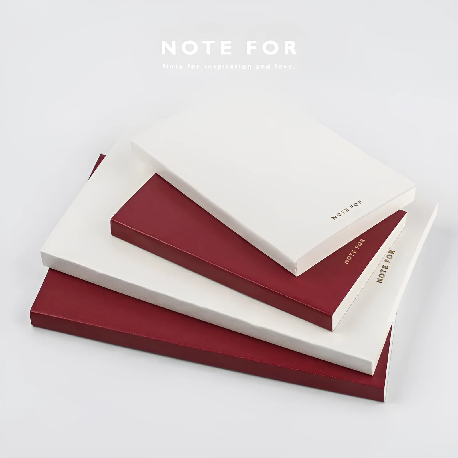 Simple retro A5 notebook with red imitation leather cover, bronzing detail, and dot matrix pages