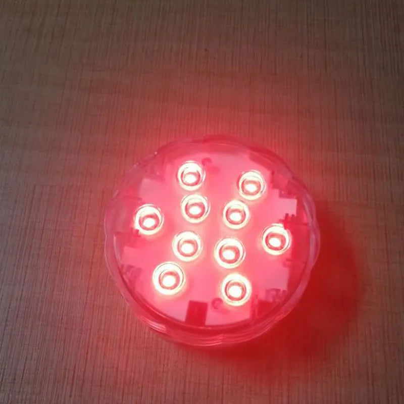 White spherical underwater LED light with remote control for swimming pools and aquariums