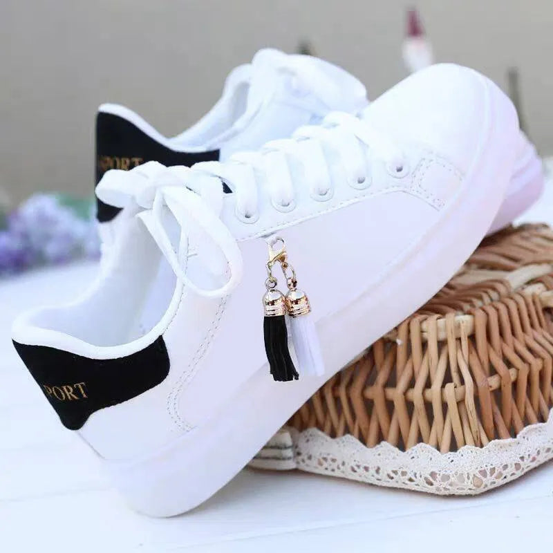 Women's white mesh casual flats with PU upper and rubber sole in black or pink colour options