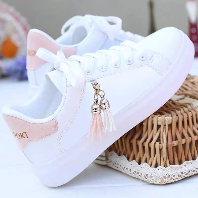 Women's white mesh casual flats with PU upper and rubber sole in black or pink colour options