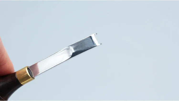 Leather hand tool for sharpening and thinning wide shovel edges, model 02.
