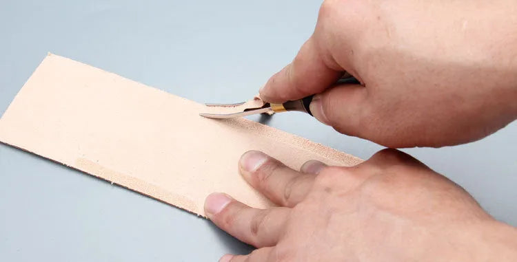 Leather hand tool for sharpening and thinning wide shovel edges, model 02.
