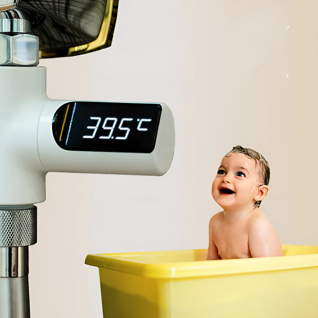 Electronic baby bathing faucet thermometer with electroplated finish showing temperature display