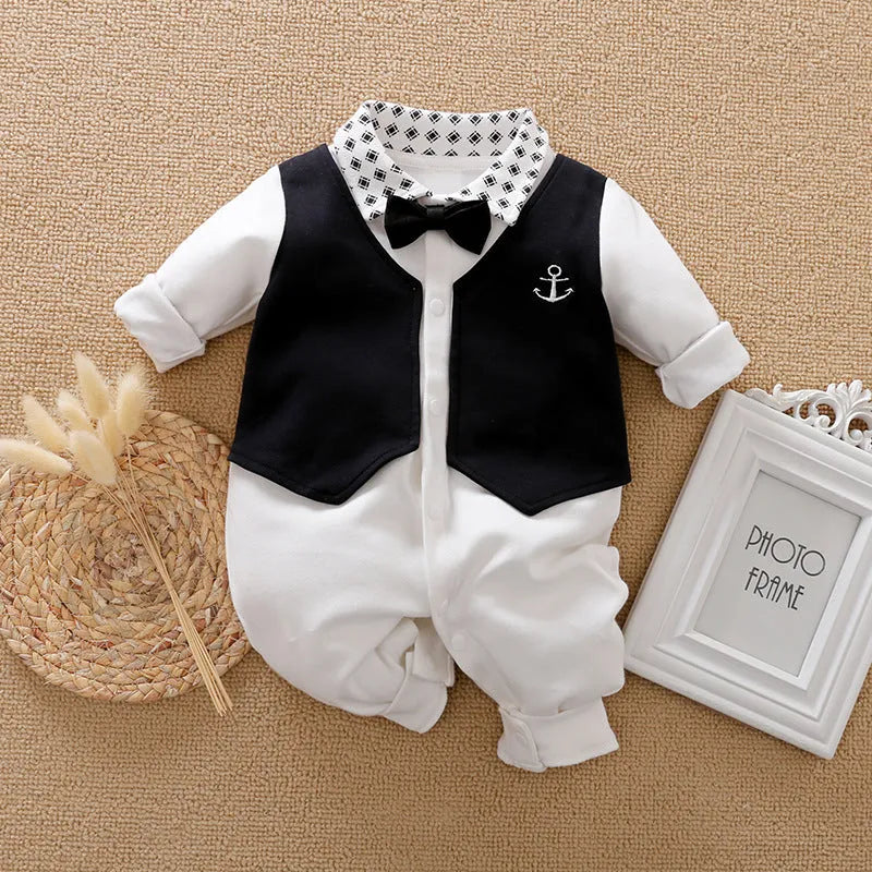 Baby boy in a long-sleeved cotton jumpsuit with gentleman-style detailing for spring or autumn wear.