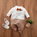Baby boy in a long-sleeved cotton jumpsuit with gentleman-style detailing for spring or autumn wear.