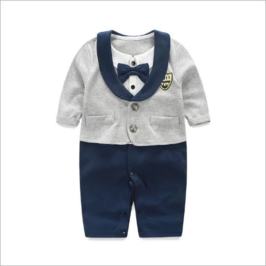 Baby boy in a long-sleeved cotton jumpsuit with gentleman-style detailing for spring or autumn wear.