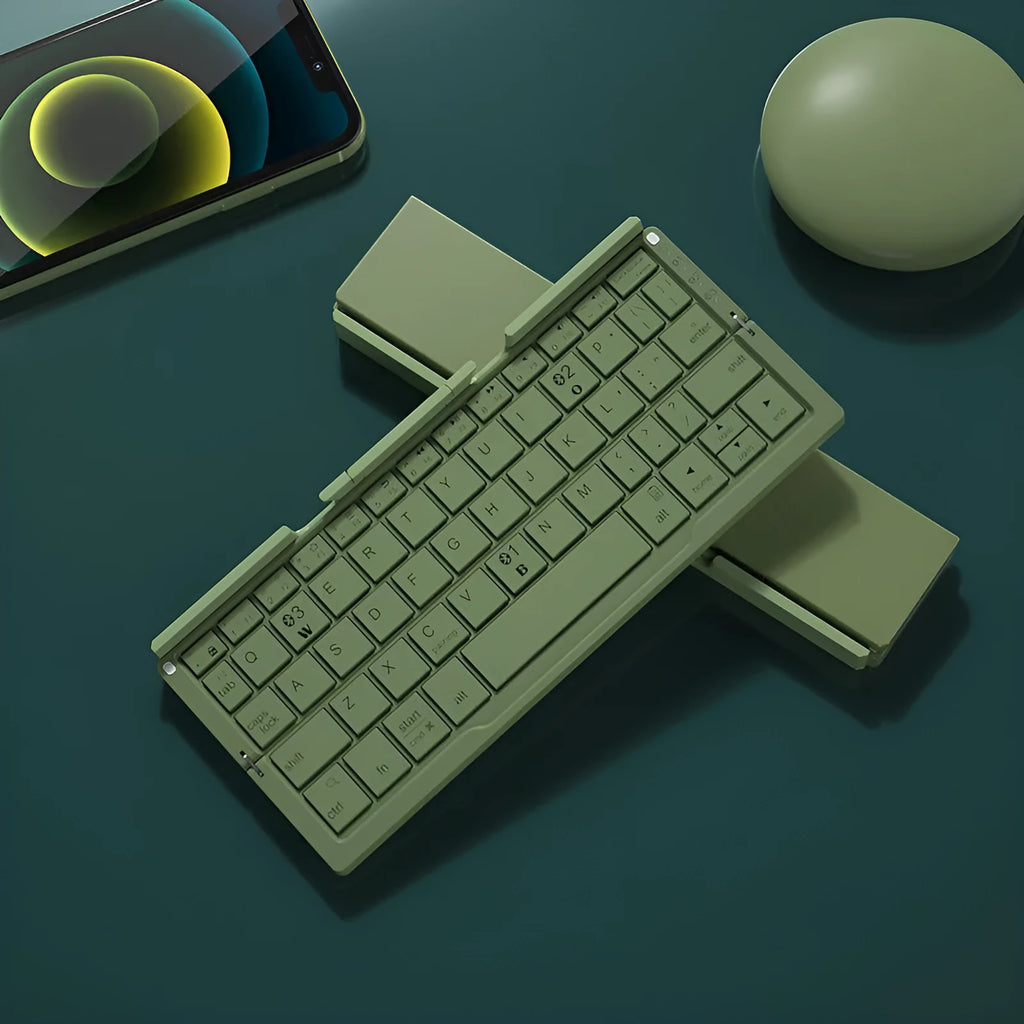 Silver white folding Bluetooth keyboard with integrated stand holding a smartphone