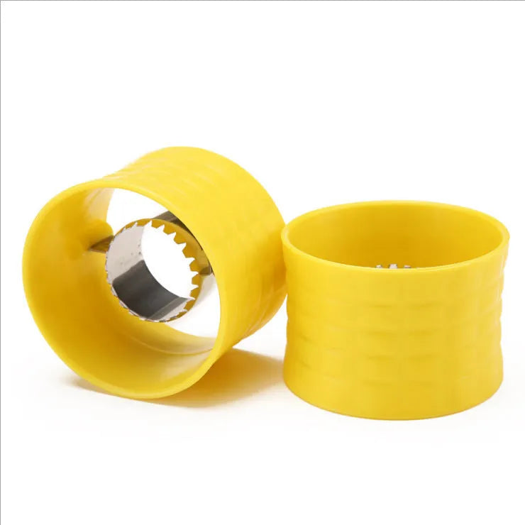 Yellow corn-shaped manual kitchen thresher tool for removing kernels from corn on the cob.