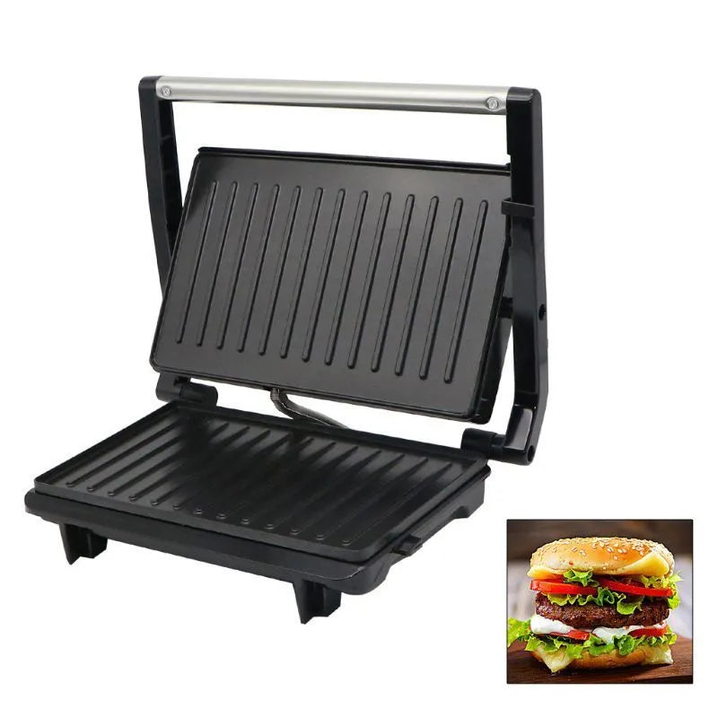 Nonstick electric steak maker grill with black casing, adjustable temperature knob, and wrap-around power cord on a kitchen worktop.